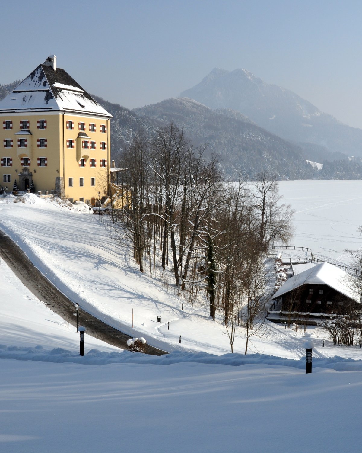Schloss Fuschl, a lakeside castle near Salzburg, in winter